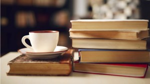 Book stack with coffee. Image courtesy of Google Images